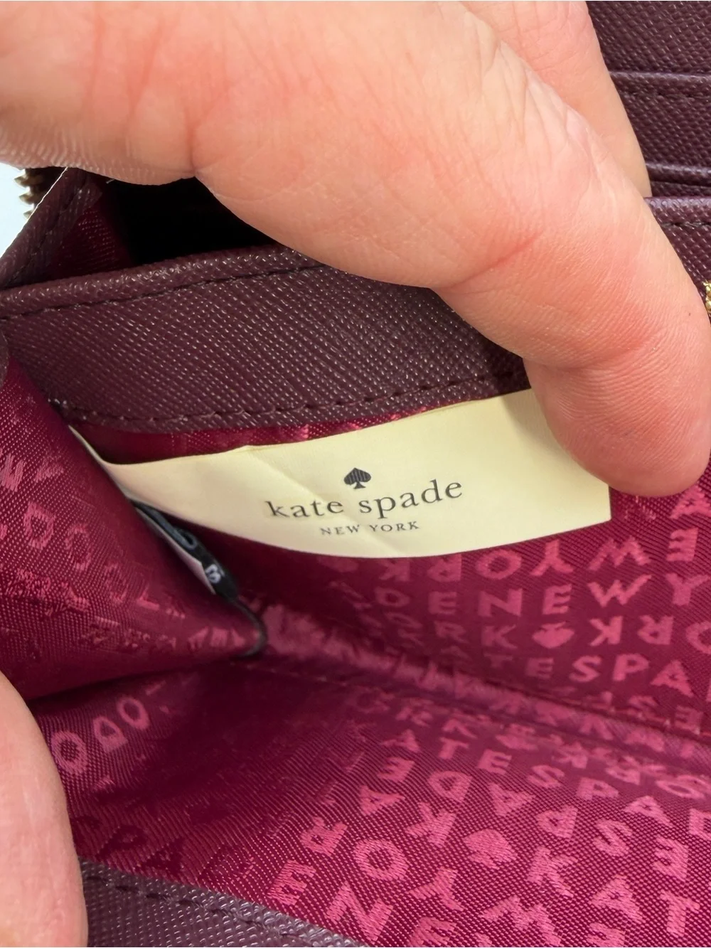 kate spade Zip-Around Wallet in Burgundy with Gold Hardware